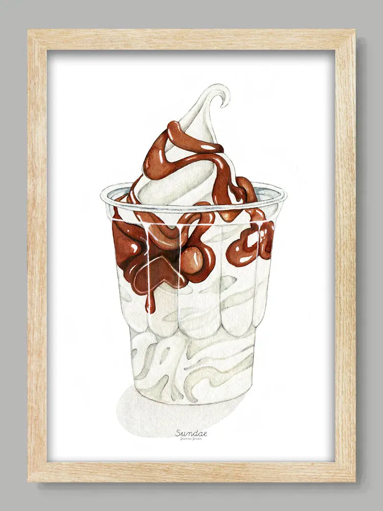 Framed artwork of a soft serve ice cream with chocolate sauce in a clear cup on a gray background.