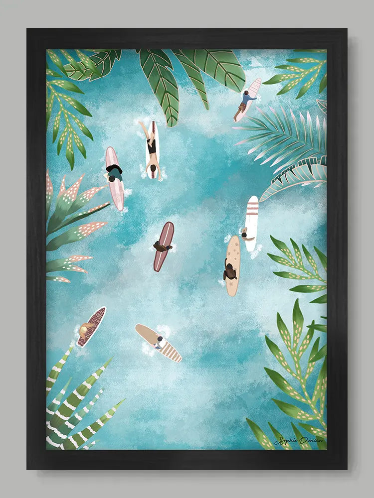 Framed artwork of people swimming and snorkeling with tropical plants on a blue background