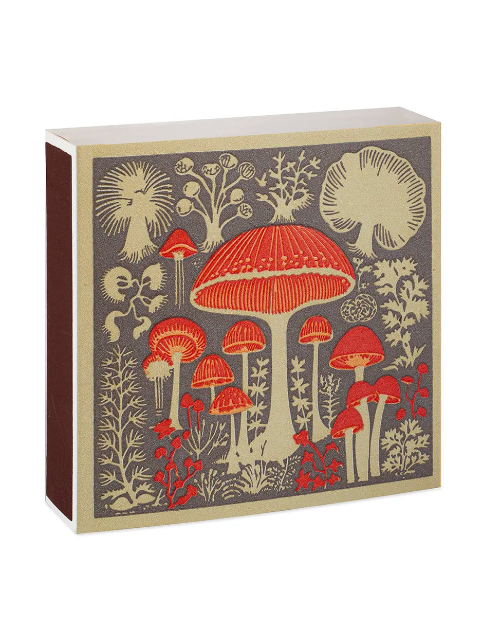 Square matchbox featuring a selection of wild mushrooms in neutral tones with pops of red detailing.

Striking in every sense – these matchboxes are filled with 125 matchsticks ready to spark a little joy. Designed to add character to coffee tables, mantelpieces, and gift drawers, each box is a blend of function and flair.