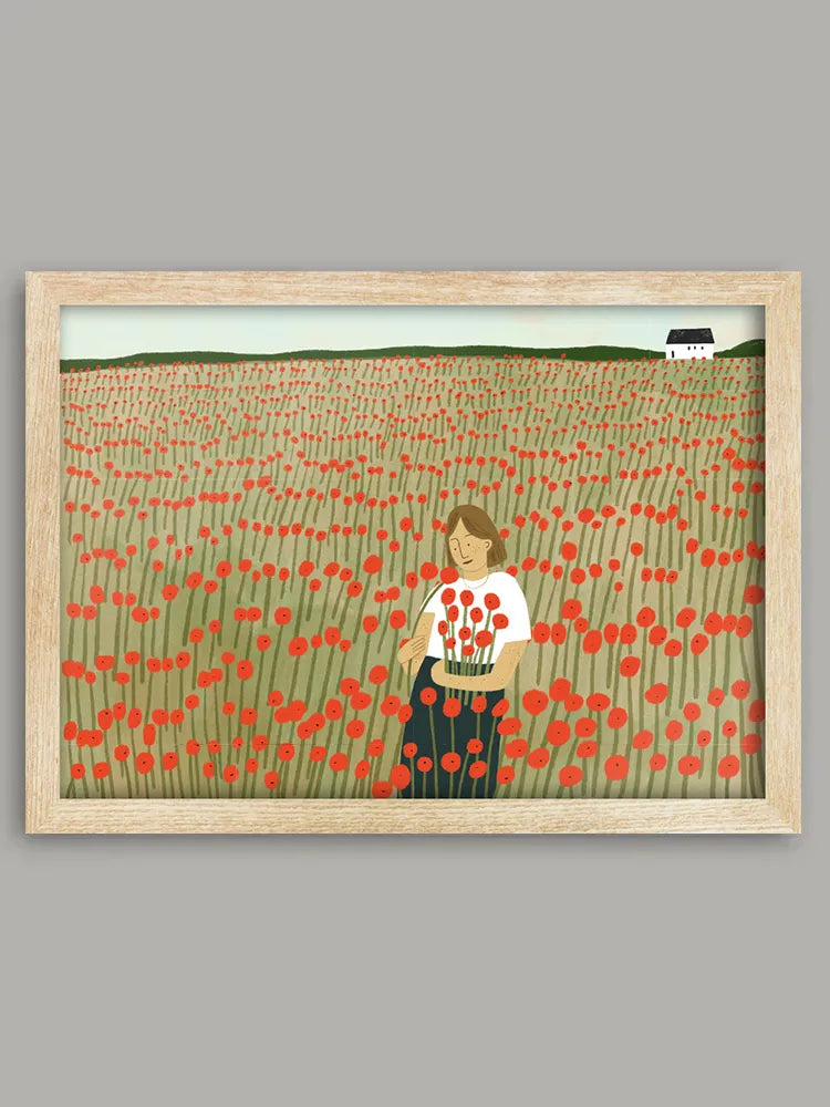 Framed artwork of a person holding flowers in a field of red flowers on a gray background