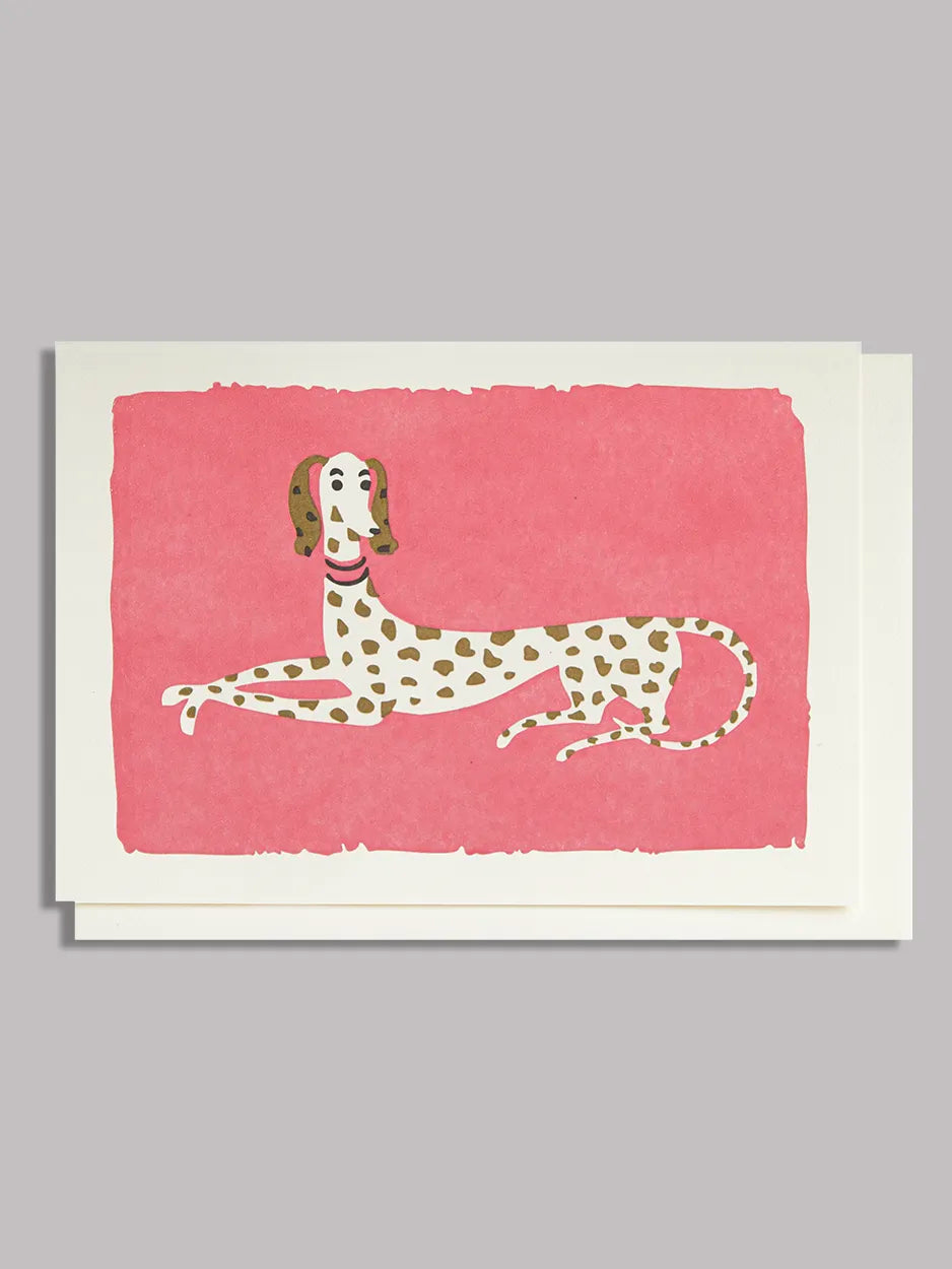 Mini greeting card featuring an elegant Dalmatian laying down on a bright pink background.