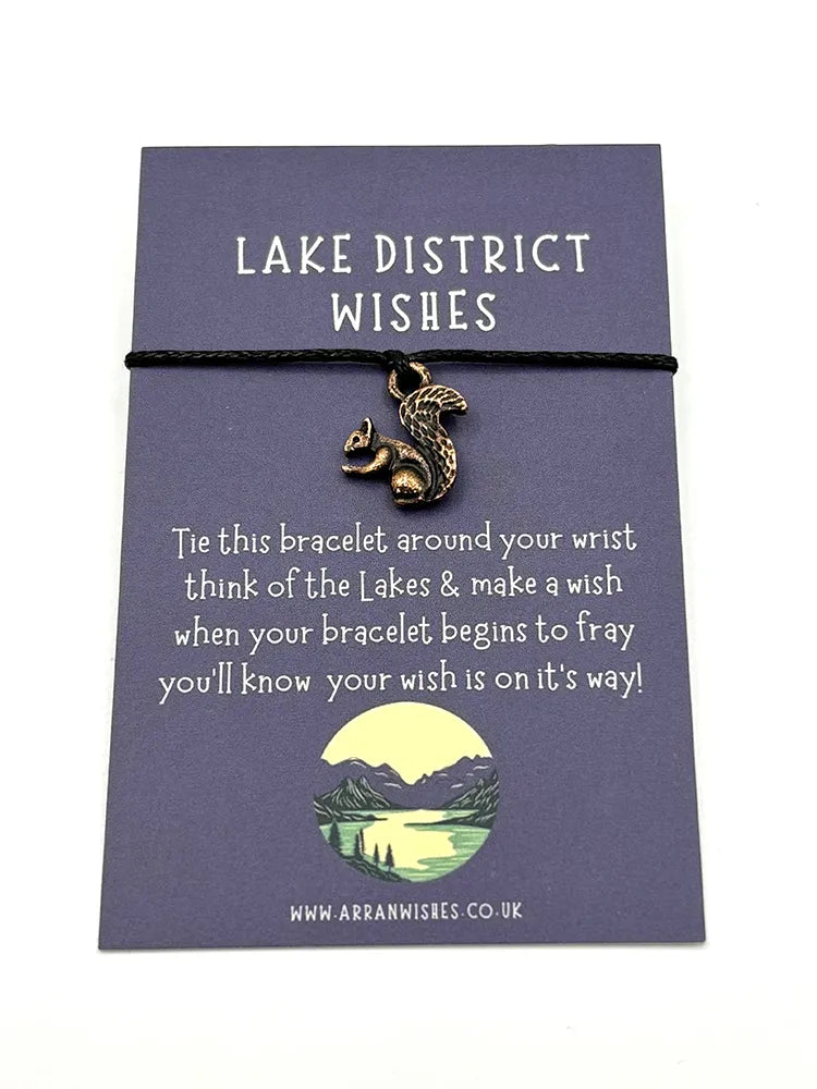Bracelet with a squirrel charm on a Lake District Wishes card