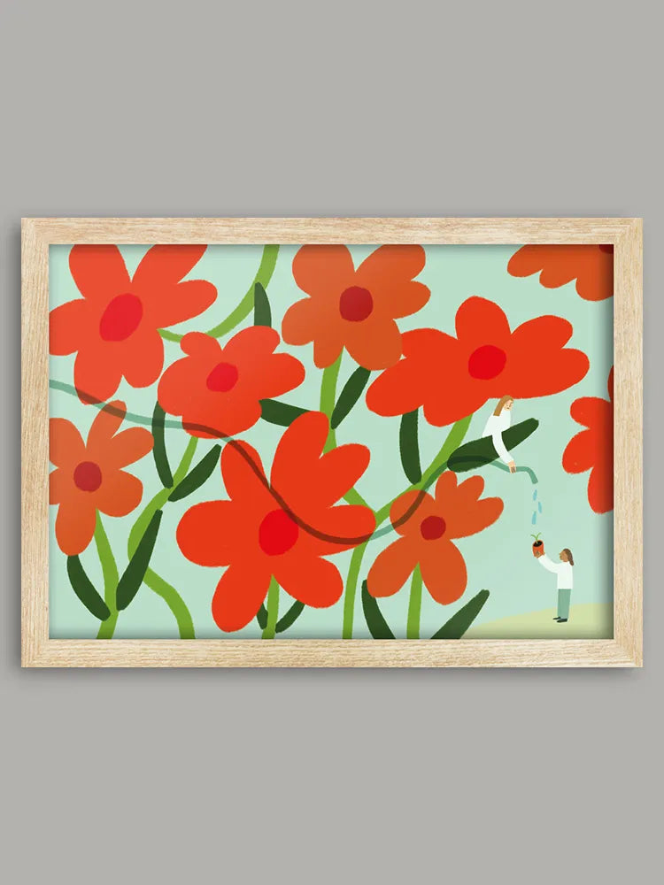 Framed artwork with red flowers on a light blue background