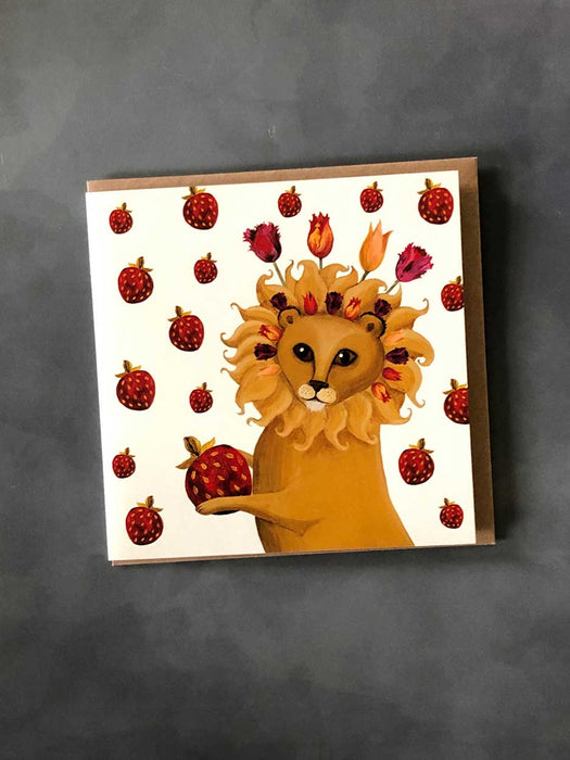 lion eating strawberries card